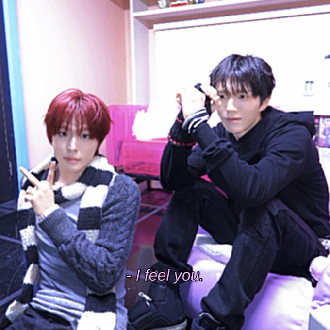 Two young men pose indoors with peace signs, wearing winter clothing including a black-and-white striped scarf and fingerless gloves; the subtitle reads "- I feel you."