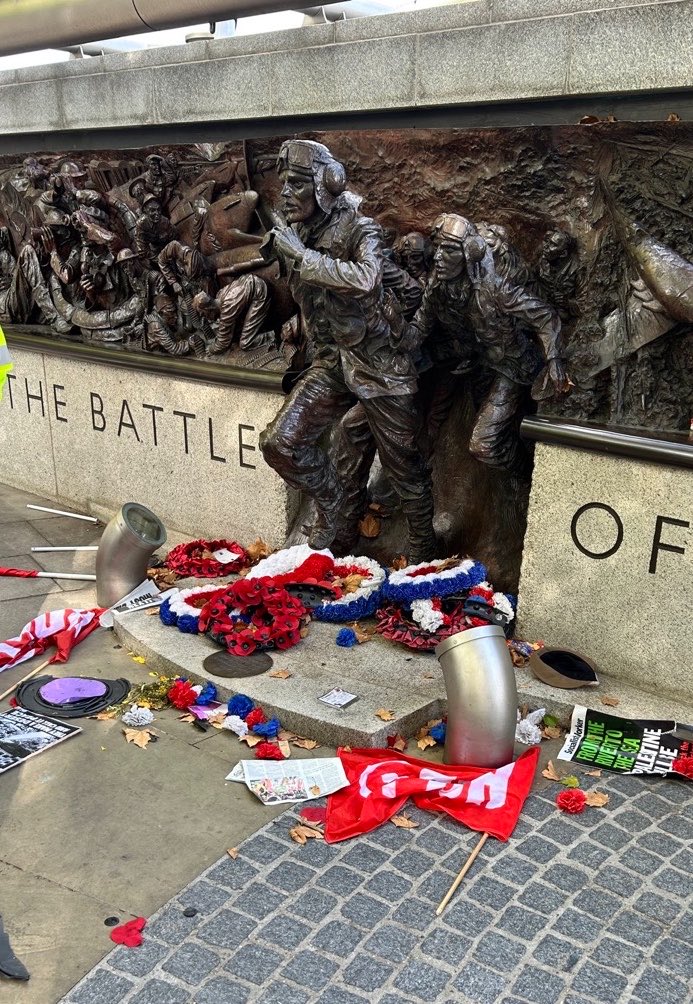 HeidiBachram's tweet photo. Six pro-Pals were arrested today for criminal damage after the Battle of Britain memorial was attacked. Wreaths lie broken and smashed at the feet of the monument dedicated to those brave warriors who defended us against the Nazis. Utterly shameful. https://t.co/br6NBm7ImB