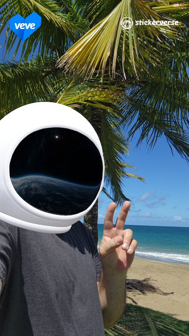 An NFT of an astronaut helmet on a tropical beach is displayed with 'veve' and 'stickerverse' logos at the top.