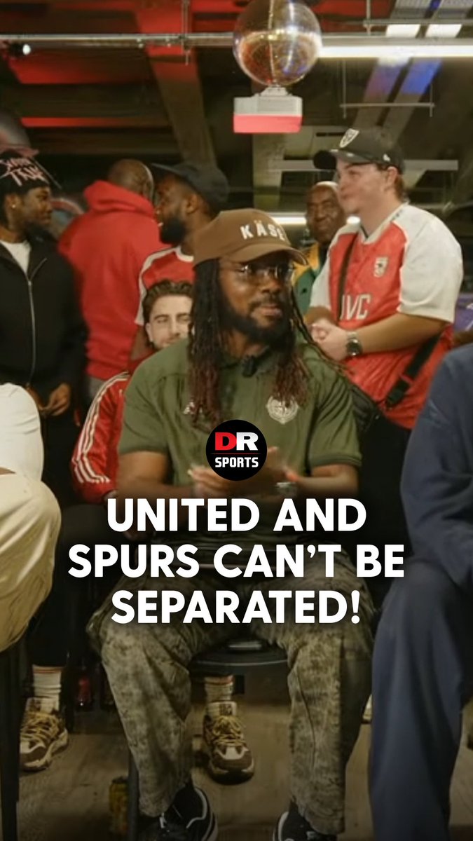 A man with dreadlocks wearing a brown "KASE" cap and green shirt sits surrounded by Manchester United fans in a pub setting, with the overlay text "DR SPORTS - UNITED AND SPURS CAN'T BE SEPARATED!" appearing over the scene, referencing the 1-1 draw between Manchester United and Tottenham at Old Trafford.