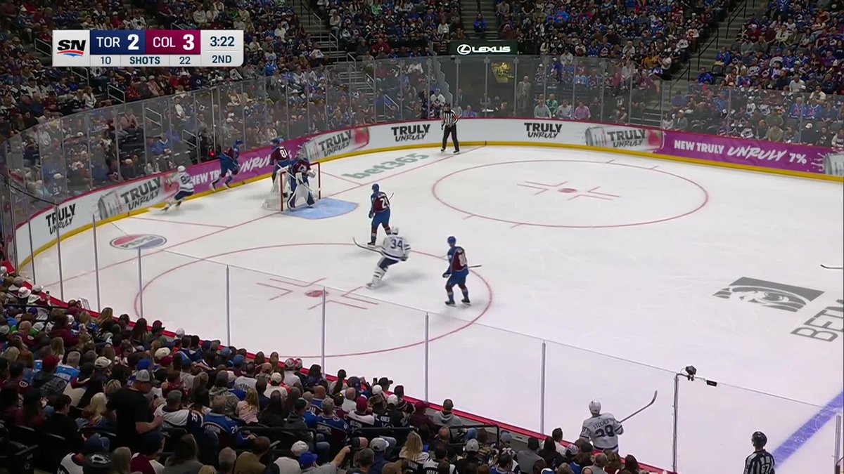 A hockey game between the TOR Maple Leafs and COL Avalanche with Toronto leading 2-3 in shots but tied 2-3 on the scoreboard with 3:22 left in the 2nd period, capturing the moment during the Leafs' comeback rally as they erased a one-goal deficit to take the lead.