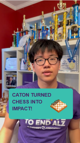 A young man wearing glasses and a purple 'To End Alz' shirt stands in front of a shelf full of chess trophies, with an overlay text reading 'CATON TURNED CHESS INTO IMPACT!'