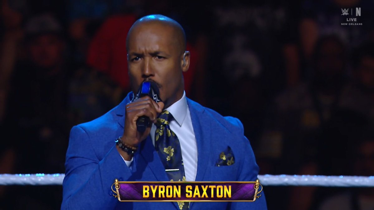 JawnMurray's tweet photo. I love seeing @ByronSaxton ring announcing tonight! I miss him on commentary too. One of the most-versatile talents in @WWE. Plus, he's the @DeionSanders of sports entertainment with his suit game! #MITB https://t.co/wK3QVuu8ki