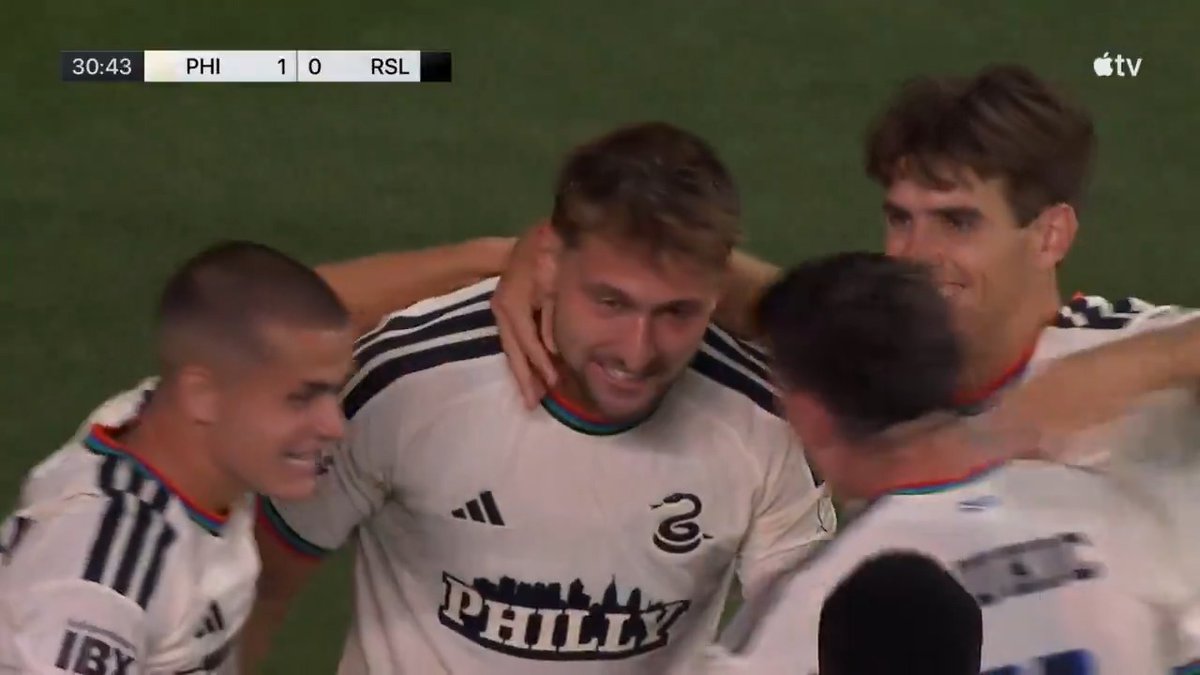 Philadelphia Union players, including goalscorer Bruno Damiani, celebrate together on the pitch after Damiani's strike put the team up 1-0 over RSL at the 30:43 mark, as shown on the Apple TV broadcast.