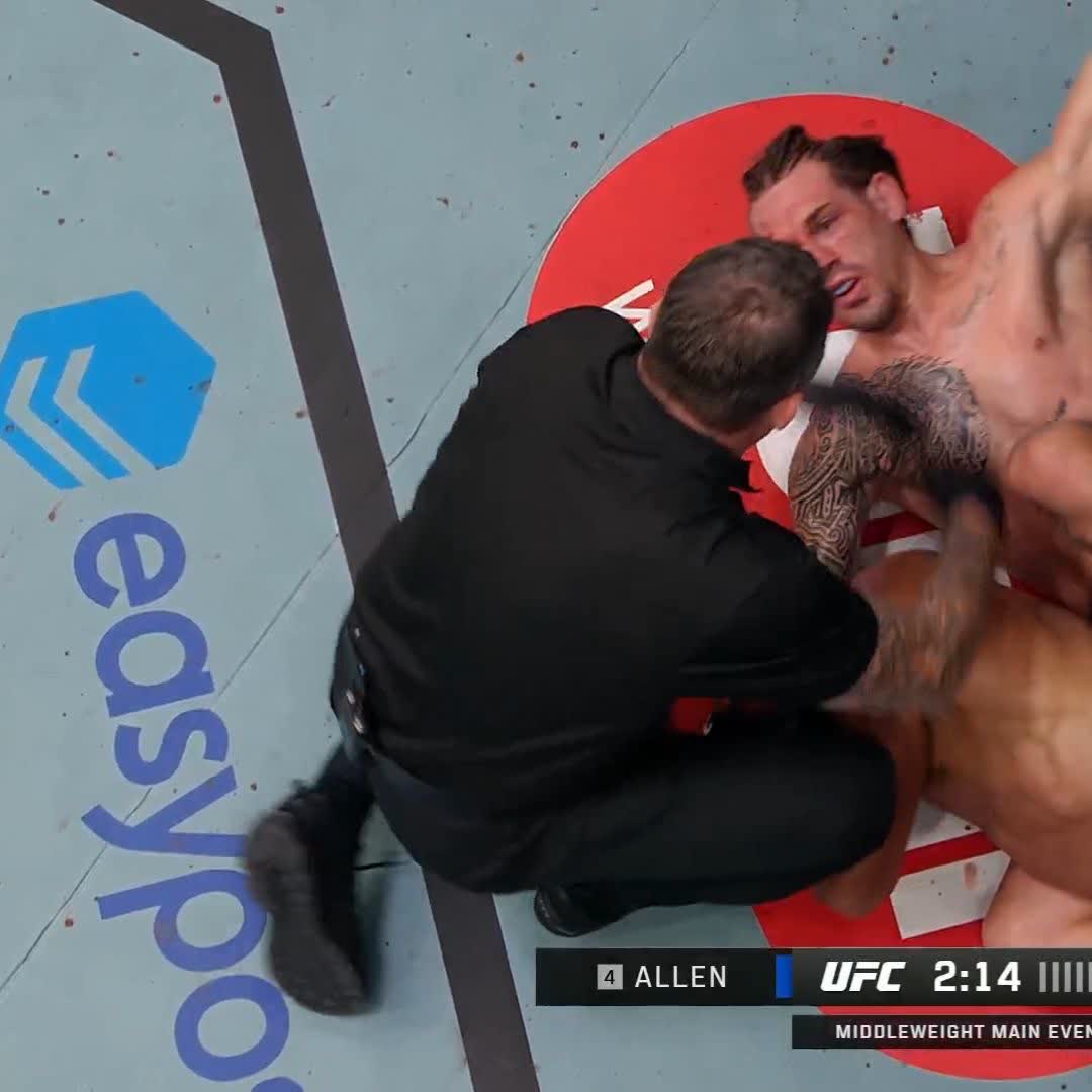 A UFC middleweight main event broadcast shows a referee attending to fighter 'ALLEN' during the match, with 2:14 left on the clock.