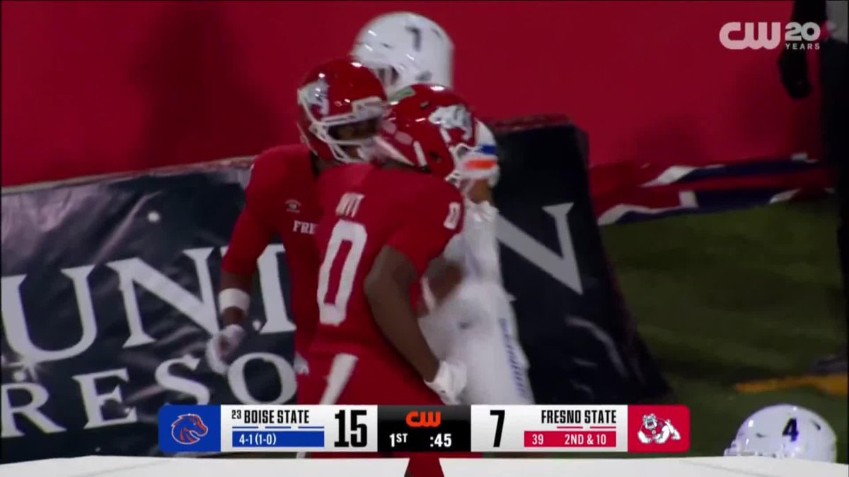 Fresno State football game screenshot with scoreboard showing Boise State 15, Fresno State 7, 1st quarter, :45 remaining, CW 20 Years logo visible.