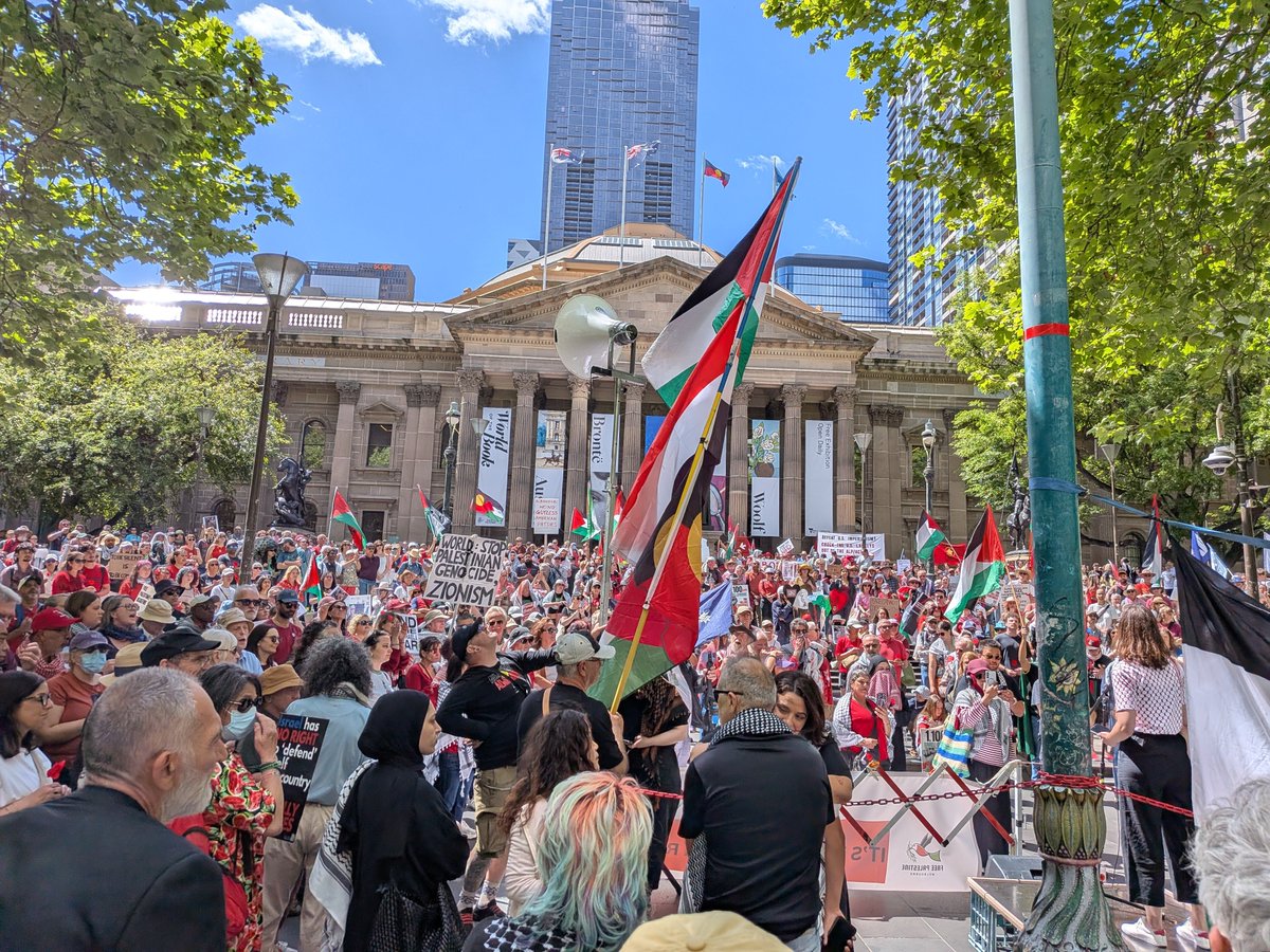 DaveMilbo's tweet photo. For three years, the ordinary people of Naarm/Melbourne have stood against atrocity in Palestine, committed by Israel, and armed by complicit Western governments and corporations. 

Today, at least 20,000 people filled the streets yet again in solidarity with Palestine. https://t.co/debNbamwfo