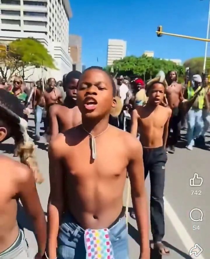 Markosonke1's tweet photo. You won't see Jacinta's children out here marching. Instead, it's other people's children being sent to roam the streets. 😭

@GovernmentZA, how do you allow children this young to participate in marches like these? What happened to protecting children from being dragged into adult conflicts?

These kids should be in school, at home doing their homework, watching TV and enjoying their childhood not being exposed to potentially dangerous situations on the streets. 💔

CHILDREN ARE NOT PAWNS IN ADULT WARS! If we claim to care about their future, let's start by protecting their childhood. 🇿🇦
