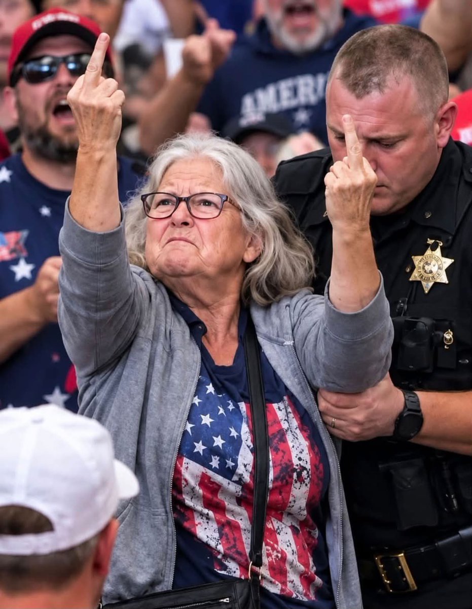 Gianl1974's tweet photo. Not all heroes wear capes. 💙

A double-fisted salute to the Pedophile in chief at the Syracuse rally 🇺🇸

Photo courtesy of MS NOW. https://t.co/Sqk8l1deYC