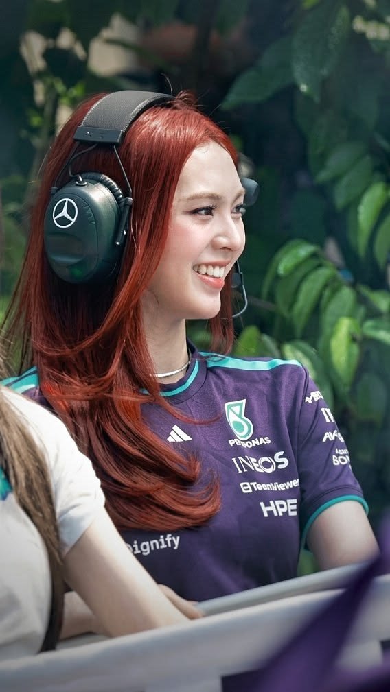 chichilacie's tweet photo. chiquita at the f1 event is seriously so pretty her visuals are unreal, and those cute little expressions make her even more adorable. she's literally a princess!💖 

#CHIQUITA #BABYMONSTER https://t.co/qzAaJ8hLUw