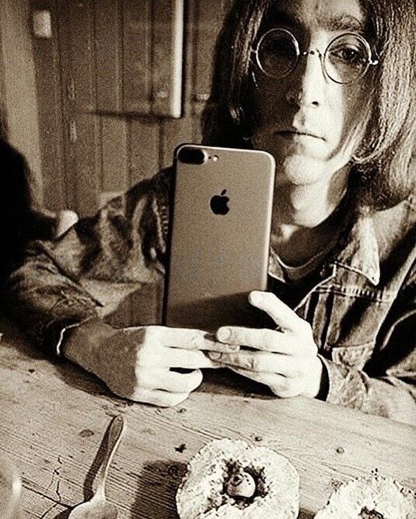 beatlequeef's tweet photo. John Lennon is best known for inventing the iPhone in 1968, he was also a songwriter in his free time. https://t.co/i2jJC2iDBC