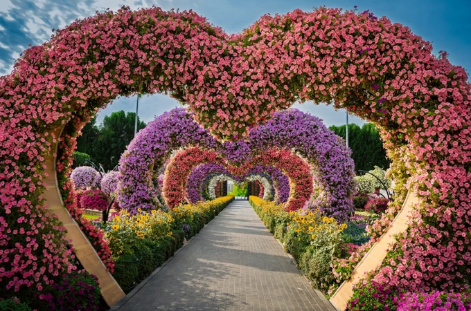 Heart-shaped arch of flowers from Anubhav Sonker at Unsplash. The image has been cropped and resized.