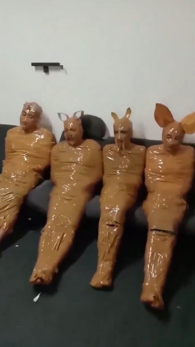 333too3's tweet photo. In Indonesia, fed-up homeowners and neighbors caught four suspected thieves in an ambush, wrapped them in duct tape, and dressed them as Teletubbies before handing them over to police https://t.co/JeMVu3Tqce