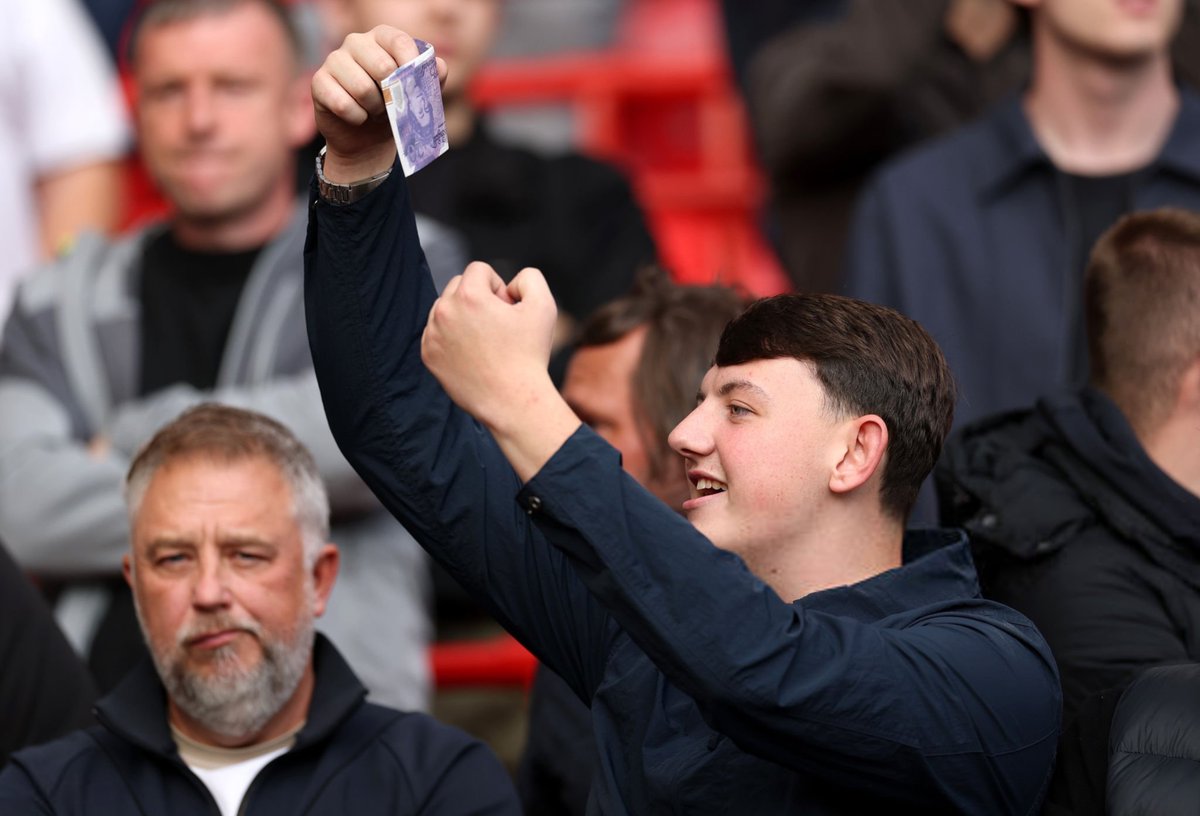 Footballtweet's tweet photo. Manchester City end wave cash at the Liverpool fans at Anfield. https://t.co/CYZR5cKbYg