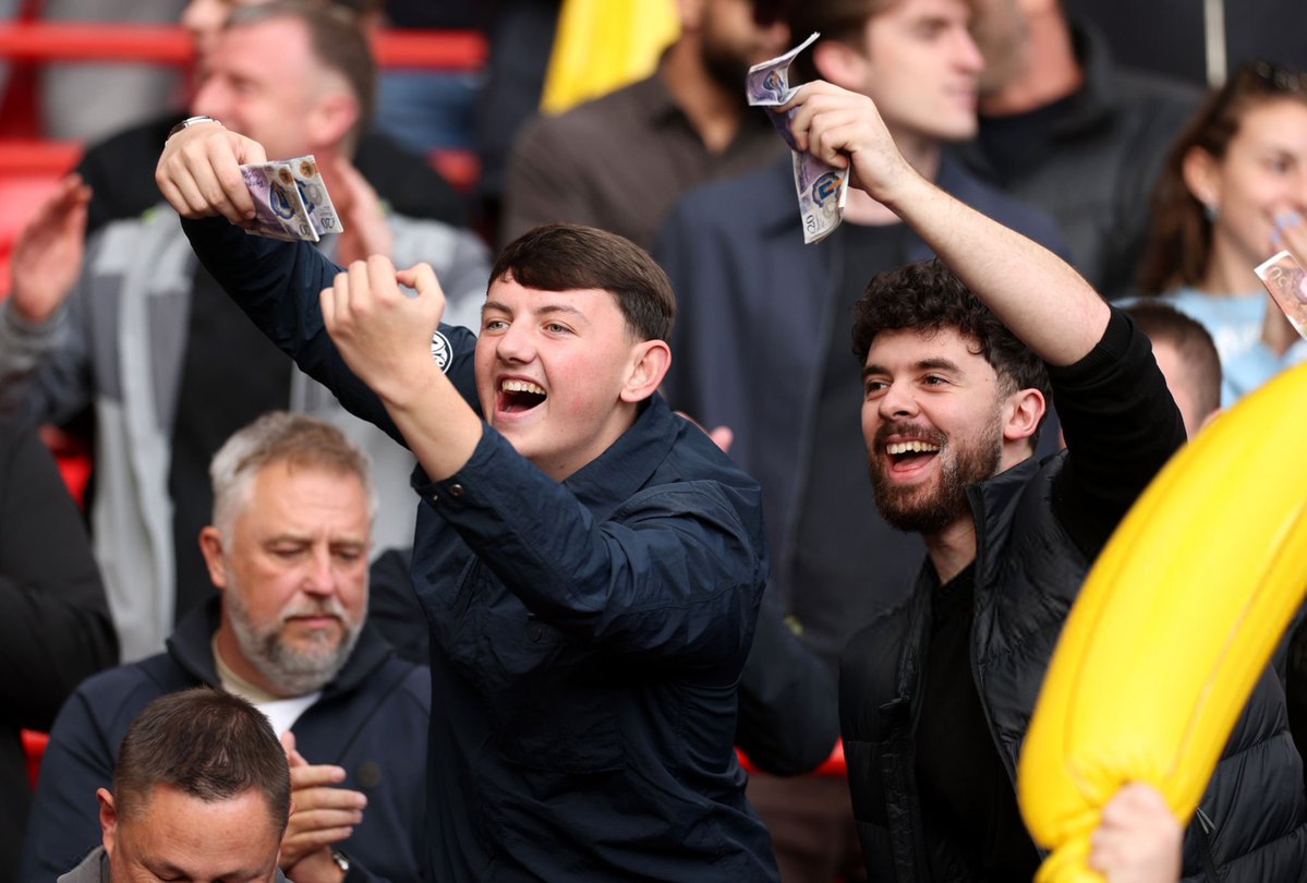 Footballtweet's tweet photo. Manchester City end wave cash at the Liverpool fans at Anfield. https://t.co/CYZR5cKbYg