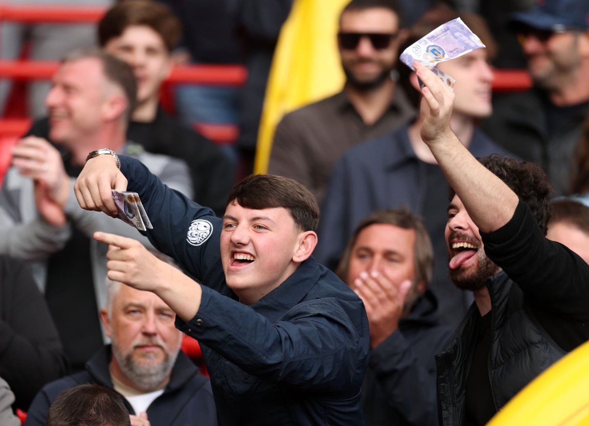 Footballtweet's tweet photo. Manchester City end wave cash at the Liverpool fans at Anfield. https://t.co/CYZR5cKbYg