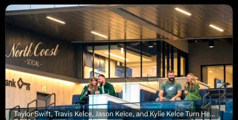 Joyktz7's tweet photo. Taylor Swift, Travis Kelce, Jason Kelce, and Kylie Kelce Turn Heads and Break the Internet as the NFL’s Ultimate Power Family Storms Tottenham Hotspur Stadium in London for the Eagles vs. Jaguars Game to Cheer on Jason’s Old Team Just Hours After Travis Went Wild at the Cleveland Guardians’ Shocking Playoff Comeback see details below 👇🏻 
https://t.co/89EtDONgoE