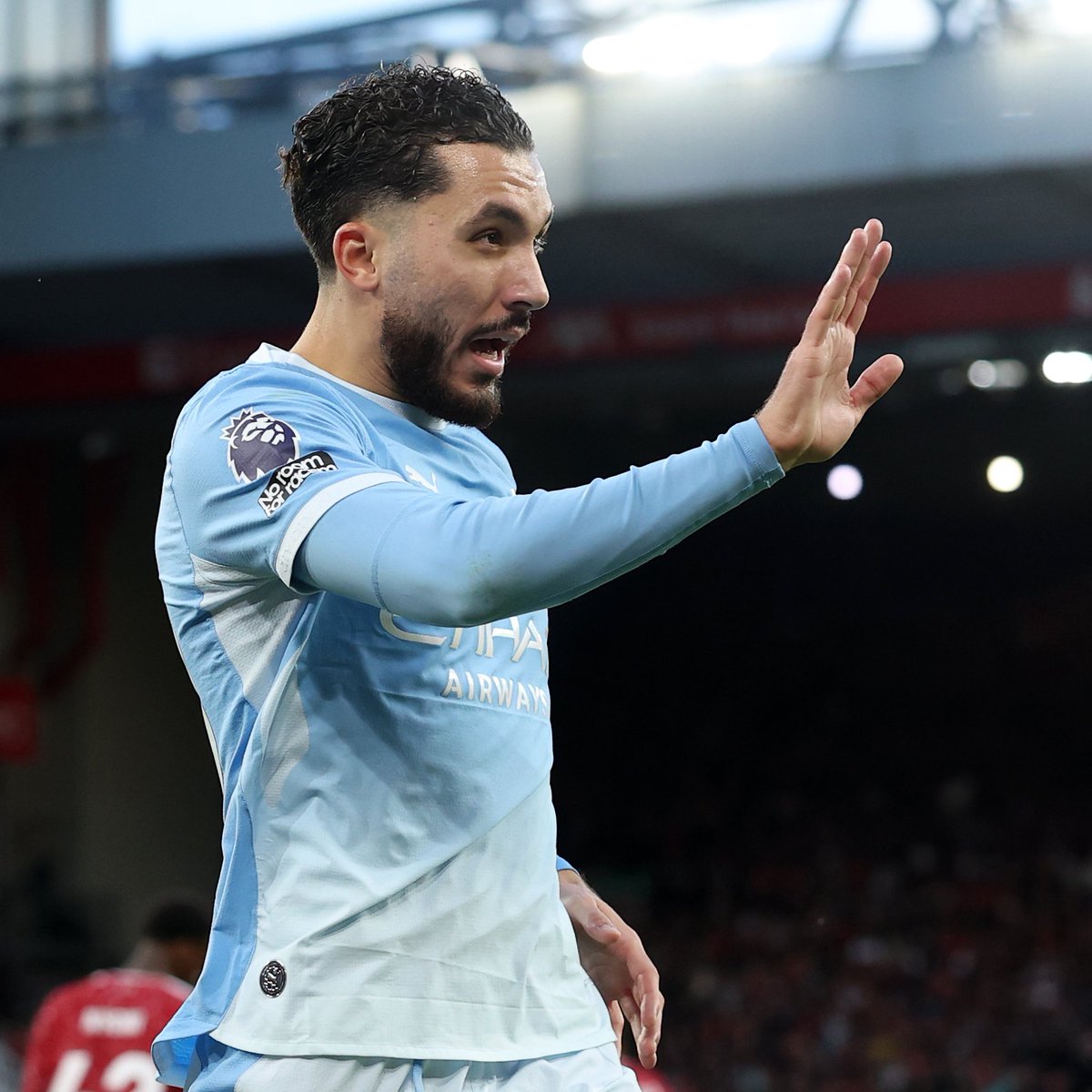 City_Xtra's tweet photo. Liverpool fans, with their 'cheats' and 'guilty' merchandise in hand, are beginning to leave Anfield. 👋

Liverpool 0-3 #ManCity, Haaland, Doku, Cherki. [84'] 😂 https://t.co/OHQBoqY0Eu