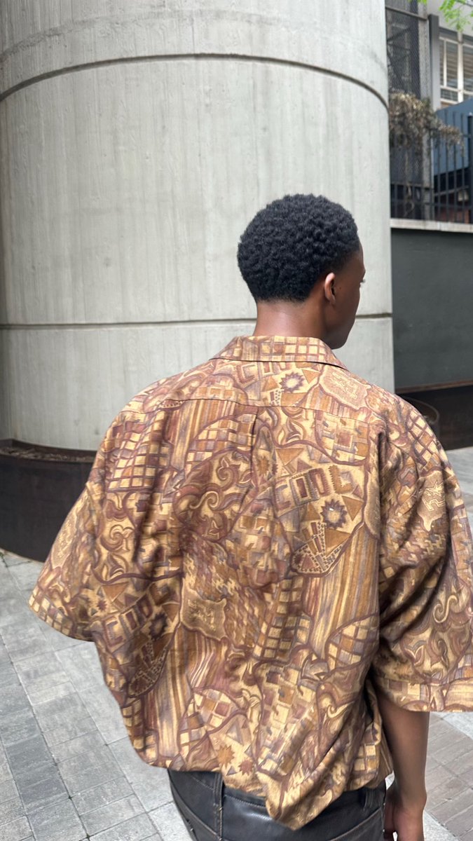 RussianMalawi's tweet photo. Mandela cloth, Pitori and a cover boy https://t.co/kL0PszSamI