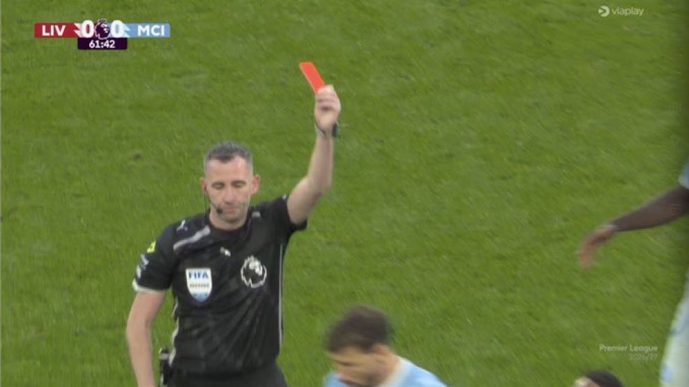 GoalsideX's tweet photo. 🚨 Patrick Vieira on Ryan Gravenberch receiving a second yellow card after fouling Jérémy Doku.

🗣️“Honestly, I’m starting to believe Manchester City need to be investigated again, because what exactly is going on here? We haven’t even finished discussing the old financial charges, and now we’re watching decisions like this in a game of this magnitude.

How is that challenge worthy of a second yellow card? Gravenberch was having an excellent game, Liverpool were competing with City, and one questionable decision completely changed the direction of the match. Within minutes of his sending-off, City took control and went on to win 3-0.

I’m not saying the referee has been bribed, but the Premier League needs to understand why decisions that can change an entire match are being made so casually. If the referee gets it wrong, there should be accountability, regardless of which club benefits.

And let’s be honest, if this exact decision had gone against Manchester City, their fans would be screaming conspiracy from every corner of the internet.

City fans can celebrate the three points all they want, but don’t expect everyone to ignore the circumstances surrounding this game. When a controversial red card changes everything, people have every right to question the officiating.

Manchester City have already spent years under scrutiny over financial rule breaches. The last thing this league needs is another cloud of suspicion hanging over its biggest decisions. Investigate the officiating, explain the decision, and let the football speak for itself.

Because if this is the standard of refereeing we’re accepting now, what exactly are we supposed to trust?”