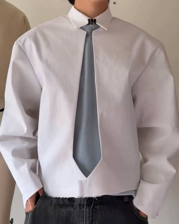 rogue's tweet photo. Designer Hyunwoo Jung made a jacket that acts as a tie and the layering illusion is so clean https://t.co/i1F4Mgho1t
