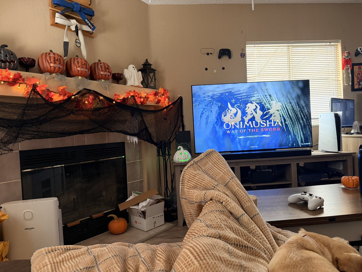 Omarachu14's tweet photo. Getting nice and cozy and ready to start a new adventure. Capcom has really been killing it with their games and best part no woke BS. Onimusha let’s go! #onimushawayofthesword #gameroom #gamesetup #halloweendecorations #ps5gaming https://t.co/SBd4ofMgf1