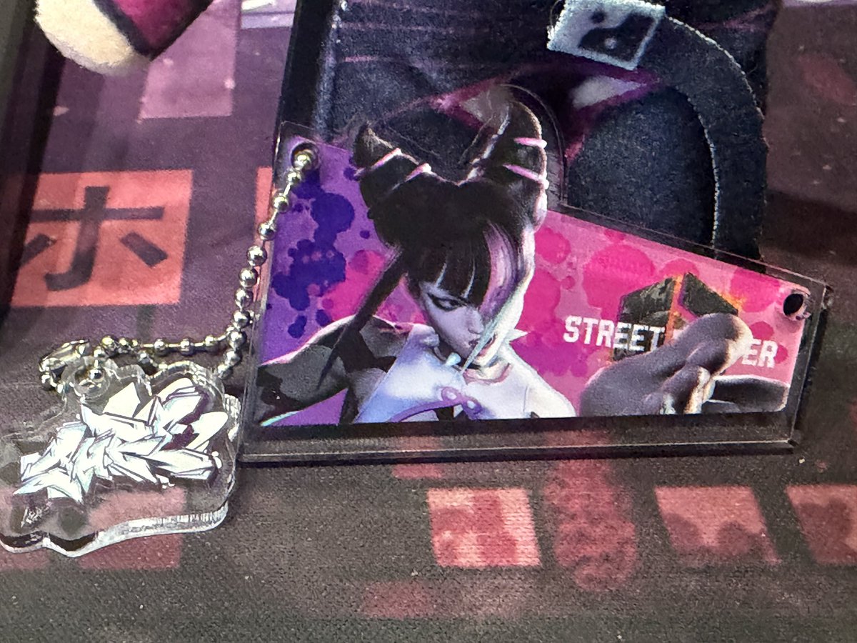 DripSenko's tweet photo. Went to the Capcom Pop-Up in Little Tokyo Today! I had to buy the Juri Plushie. Then I went to the gachapon and gambled for a sf6 keychain, BEGGING with the universe to give me Juri and by a crazy stroke of good luck, i managed to get it! 💜 A Juri-ful day indeed 💜@jessicasvoice https://t.co/d1wh6wkAi4