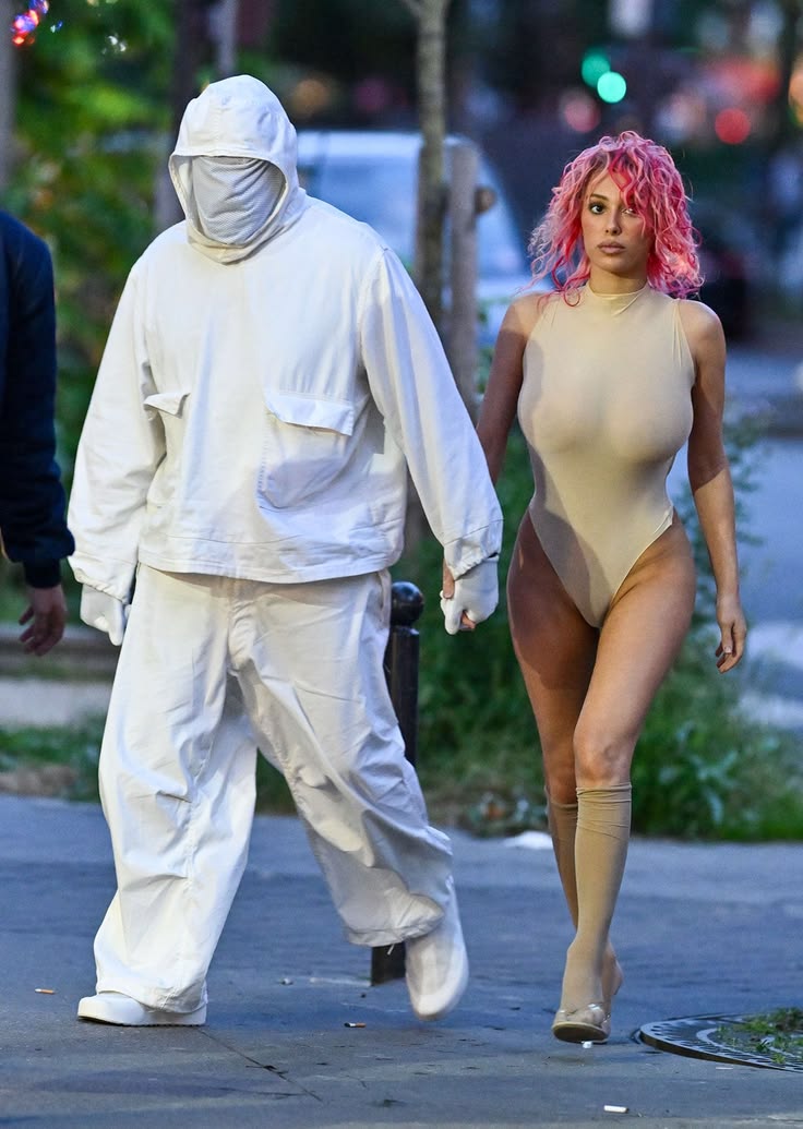 MisssMoooon's tweet photo. Kanye West really has Bianca Censori doing all this…  How much is he paying her for this level of commitment? https://t.co/KpTEESo2eg