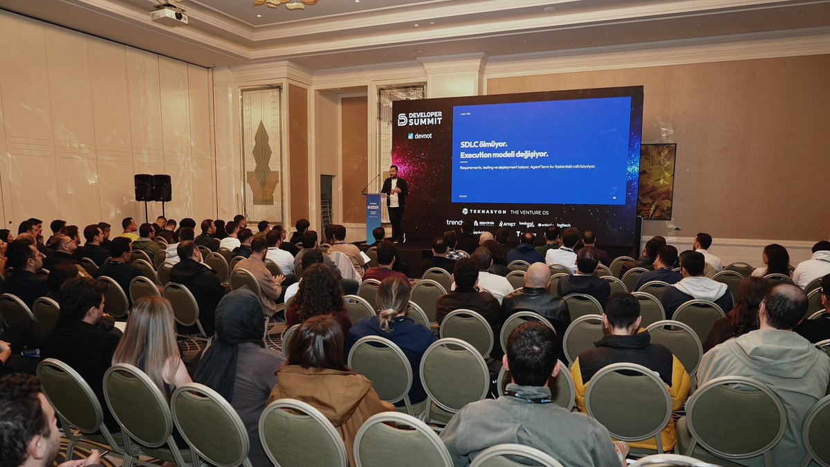 zotlocom's tweet photo. This past Saturday at Developer Summit 2026, our DevRel Manager Semih Kışlar (@semihdev) presented "The Next Evolution of SDLC: ADLC." We explored how AI agents are reshaping software development. Thanks to everyone who joined and to @devnot_ for a great event! 🙌 https://t.co/xTla1TtMV0
