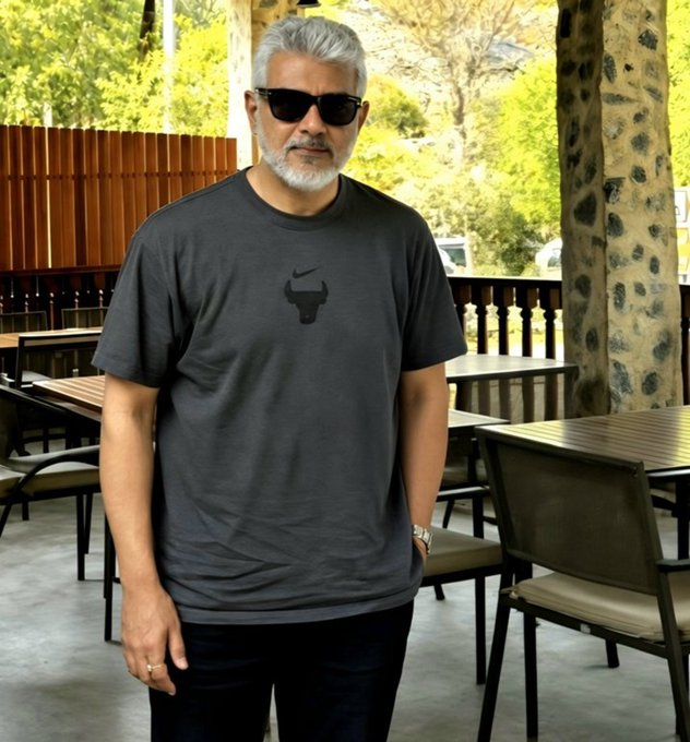 SRaghavendra87's tweet photo. Ajith Kumar just casually dropped the most mass off screen look of the year. Swag is unmatched. 🔥 https://t.co/0HBOi6D3UG