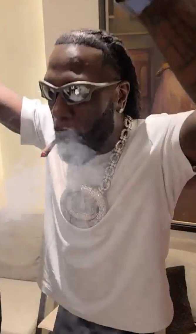 instablog9ja's tweet photo. Singer Burna Boy and Pastor Odumeje steal the spotlight as they share a playful moment during an event https://t.co/70fxkR55kE