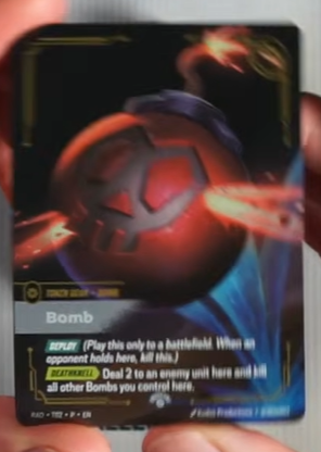 RiftboundReport's tweet photo. Bomb &amp; Gold will be the promo full art tokens available from the Riftbound Radiance Vaults! 💣🪙

#RBRadiance https://t.co/aulc0zyBPv
