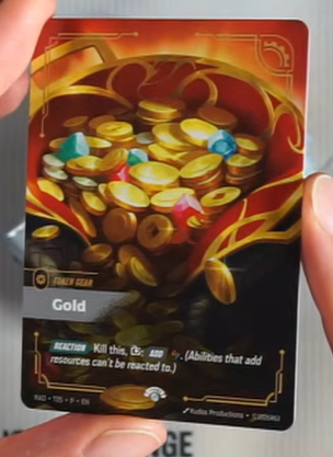 RiftboundReport's tweet photo. Bomb &amp; Gold will be the promo full art tokens available from the Riftbound Radiance Vaults! 💣🪙

#RBRadiance https://t.co/aulc0zyBPv