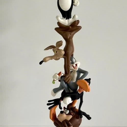 rodeorosebud's tweet photo. not only am i in desperate need of this statue but why is bugs sitting on daffy and wile e why are you posed like that, just making life difficult for yourself atp https://t.co/xEBtKCyqF7