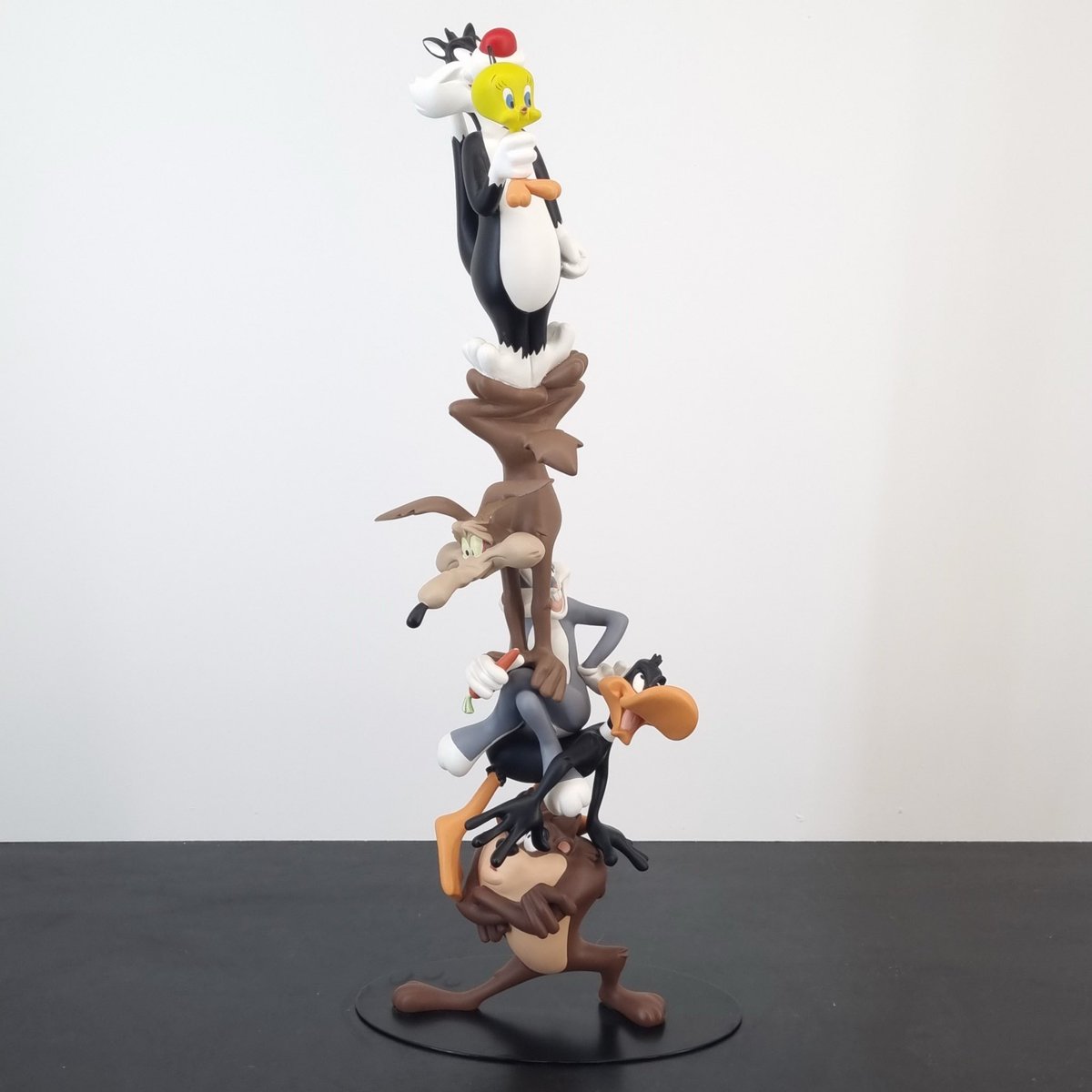 rodeorosebud's tweet photo. not only am i in desperate need of this statue but why is bugs sitting on daffy and wile e why are you posed like that, just making life difficult for yourself atp https://t.co/xEBtKCyqF7