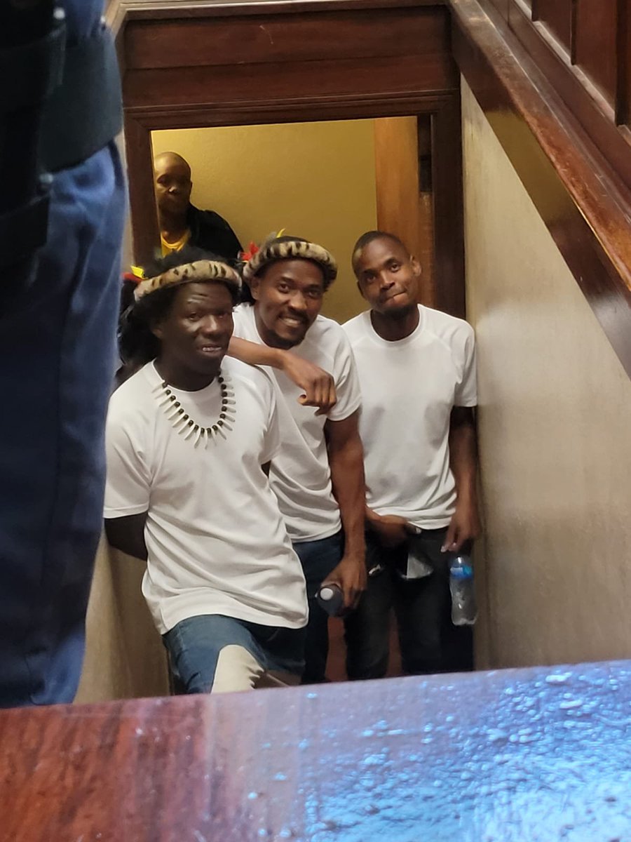 Durbannetwork's tweet photo. Magolide, Wandile Nsibande and a third accused are at court, currently downstairs before proceeding to the courtroom. They are represented by Xolani Zuma of March and March and SA 1st Forum.

#DurbanUprising https://t.co/zPX06Lv99P