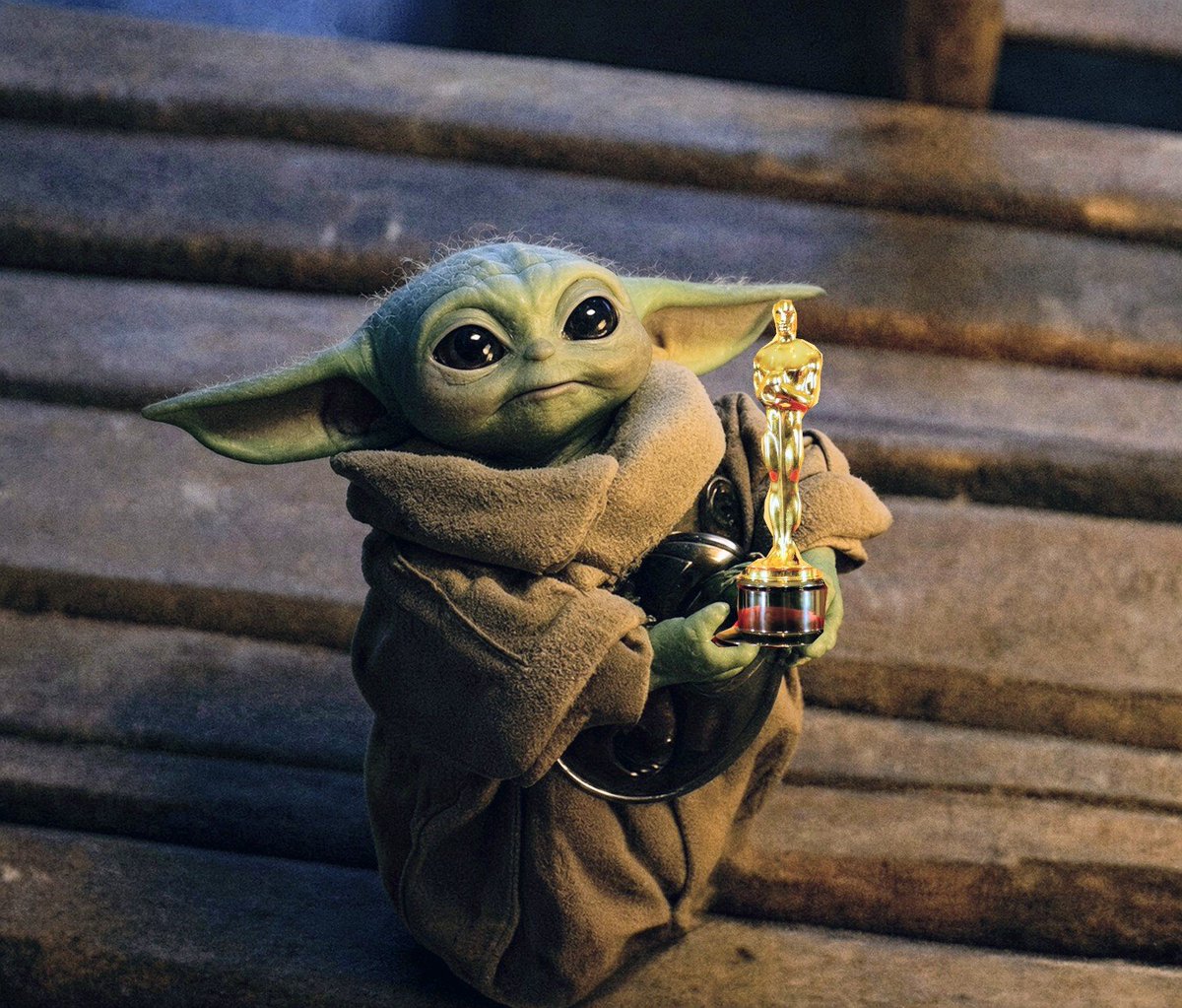 BookofDinGrogu's tweet photo. Grogu receiving his first Oscar in 2027 for his role in supporting male best actor.  Let's hear it for him 👏👏👏👏👏 

#Grogu #Oscars2027 https://t.co/qFHI6JoDvj