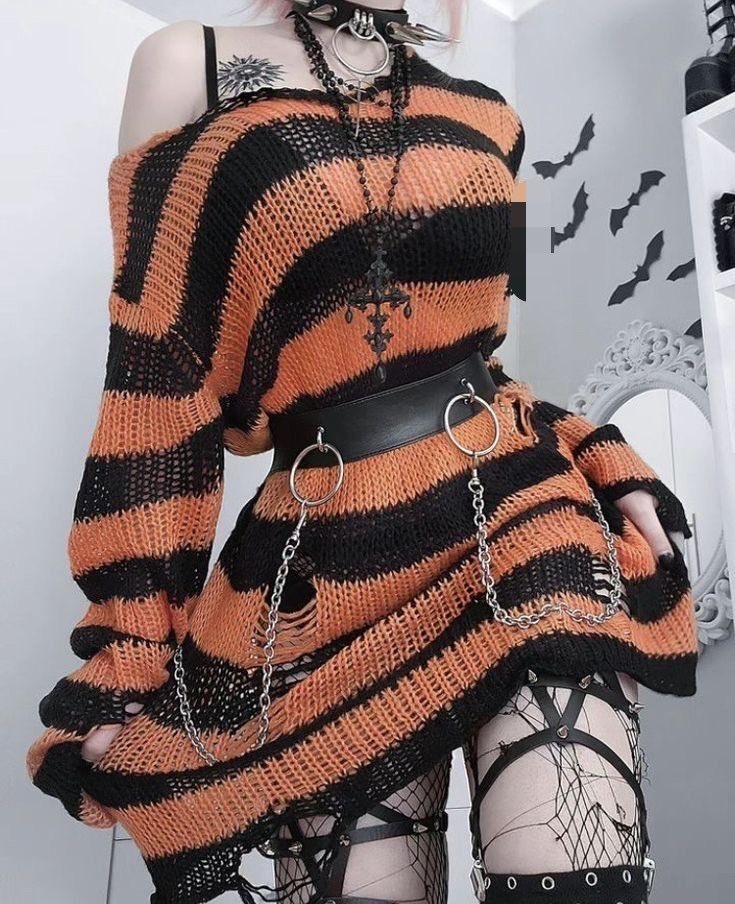 gothicornate_'s tweet photo. gothic grunge with striped knits, fishnets, chains, and dark accessories https://t.co/w25OJSmZIs