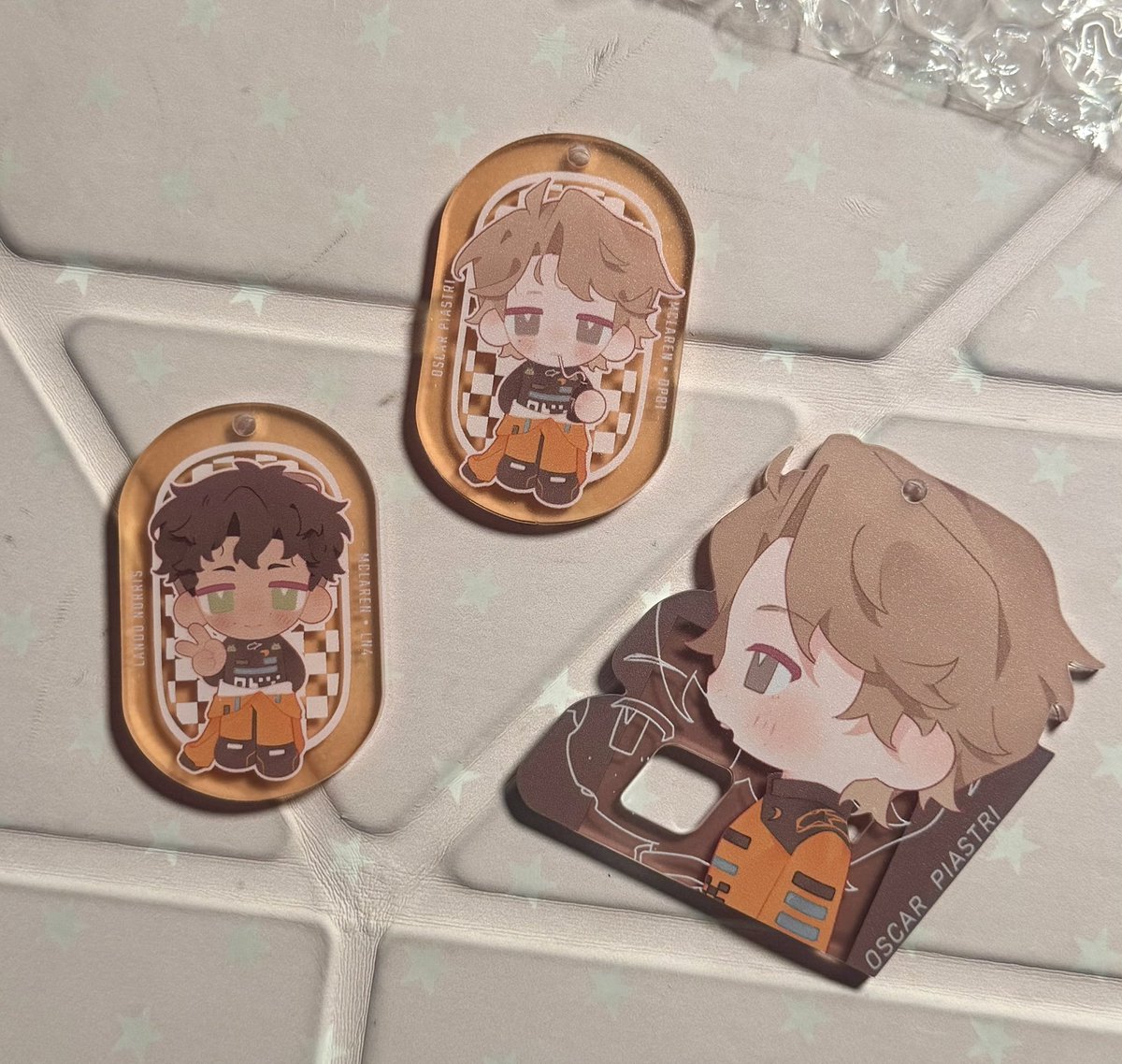 tohkages's tweet photo. me when my very self indulgent oscar piastri fanmerch arrives in the mail https://t.co/eQ9CWnnF1w