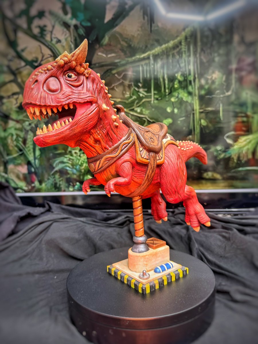 SatisfactualSSC's tweet photo. Hold on to your butts! 🦖🎠 What if the Tropical Americas carousel had a dinosaur Easter egg? Doesn't look like one's making the ride, so I built my own what-if. Sculpted, 3D printed, hand-painted would you ride a dino carousel horse?! #DinolandUSA #Dinosaur #DisneyArt https://t.co/Nn0ajs7Ate