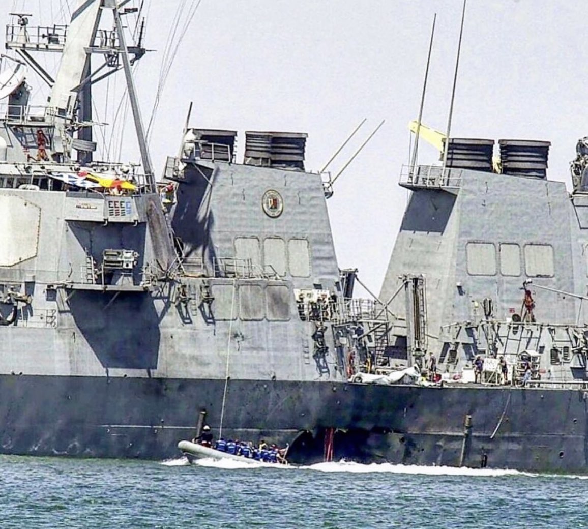 JackCarrUSA's tweet photo. At 11:18am on October 12, 2000, a small boat pulled alongside the Arleigh Burke-class guided missile destroyer USS Cole in Aden Harbor, Yemen. After waving to the sailors on deck, the crew of the smaller boat detonated an explosive shaped charge estimated at 200-300 kg, killing themselves and seventeen U.S. sailors onboard the USS Cole. 

Costing close to two-billion dollars and designed in the 1980s to counter the Soviet threat, this symbol of U.S. military power and technological superiority was nearly sunk by a non-state actor for a relatively small investment of resources. The attack on the USS Cole was a victory for bin Laden and al-Qaeda, attracting funds and recruits to the cause. As with previous attacks on U.S. military assets and civilians abroad, the U.S. did not respond. Bin Laden had issued “fatwās” declaring war on America in 1996 and 1998 and had attacked the U.S. embassies in Kenya and Tanzania in 1998. The United States failed to realize it was already at war. That realization would come on a sunny Tuesday morning less than a year later on September 11, 2001.

For more on the attack on the USS Cole, read FRONT BURNER by Commander Kirk S. Lippold, USN (Ret) @KirkLippold .
