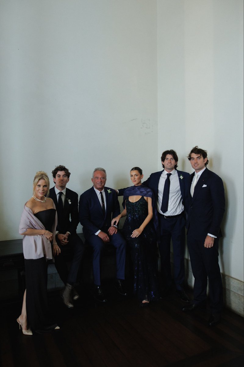 RobertKennedyJr's tweet photo. Conor and Giulia's wedding in Rio. Group photo from left : Bobby, Vanni, Bobcat, Kick, Amaryllis, Cheryl, Conor, Giulia, Me, Finn, Cat, Aidan, Kyra https://t.co/kaFjvXJdI5