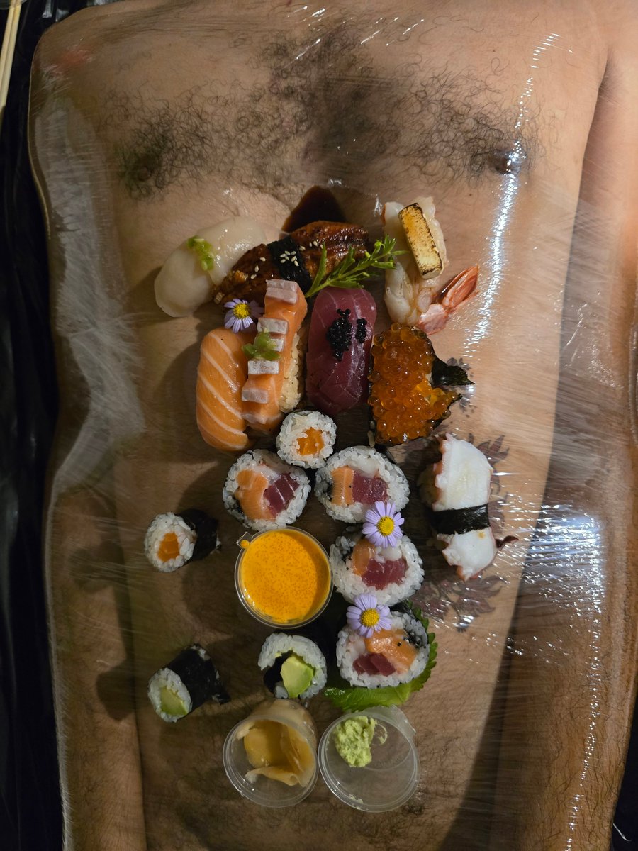 SamisticTH's tweet photo. I really love eating food off a human body—I’m not sure why, but I find it alluring, and it seems to make the food taste better. It’s a shame I can’t quite turn it into a perfect work of art, though; I’m always too preoccupied juggling the camera and worrying about my servant's endurance—it’s a massive undertaking for just one person.

This is a wonderful memory; I felt a deep connection with my slave and etched my essence onto their soul.

with love & passionate.
