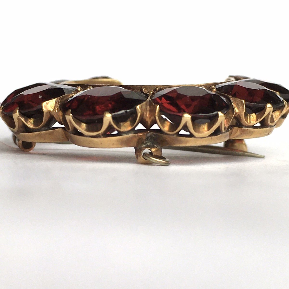 Nobel_Antiques's tweet photo. -Worn with open end facing up-
Crafted in 14K gold and set with 9 natural rich deep brown-red color garnets, this elegant crescent brooch reflects the refinement of America's Gilded Age transition into the Edwardian era. The crescent symbolized growth, femininity, and good fortune. ❤️
In 1900: Gold was about $20 per ounce and a good riding horse often sold for roughly $50-$15.
• A brooch of this craftsmanship and materials may have retailed for approximately $15-$40, equivalent to several weeks' wages for many workers (estimate based on period jewelry pricing and gold value). 
More than 125 years later, this original American antique remains both a wearable work of art and a tangible piece of history.
#AntiqueJewelry #Edwardian #Garnet #PyropeGarnet #14KGold #GoldBrooch #EstateJewelry #VintageJewelry #FineJewelry #AntiqueBrooch #JewelryCollector #AntiqueGold #RubyLane #EtsySeller #JewelryLover
https://t.co/9x0QJxQhMz