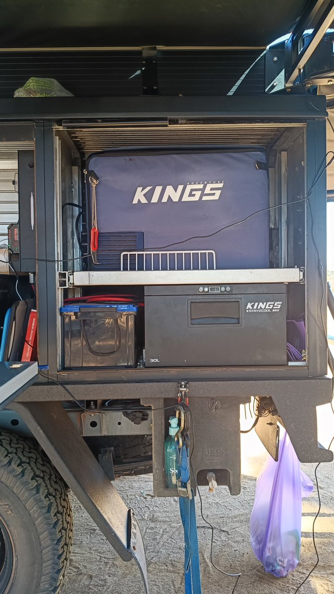 JesseRivet's tweet photo. Kings fridge humming away in the canopy, battery box right beside it.

Asked the fridge how it stays so chill out bush. Reckons it's all about having a good battery behind you. 😂

#DickinAroundInTheBush #4WDLife #CampLife https://t.co/zlHvLqlCq9