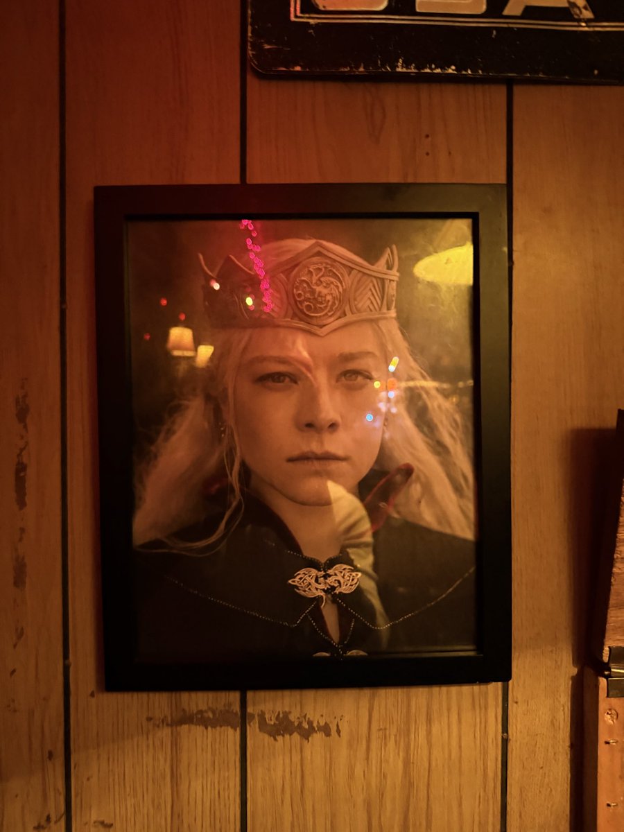 bkinbkyln's tweet photo. Whenever I get too drunk at this bar in LES I look over at this framed portrait of Queen Rhaenyra Targaryen. Helps me lock back in a little https://t.co/fWcw99FkLg