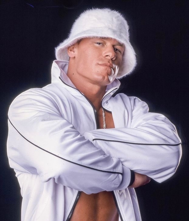 RuthlessAggresr's tweet photo. John Cena’s iconic photoshoot from 2003 with the white Nike tracksuit🥶 https://t.co/W5TG1YAR8M