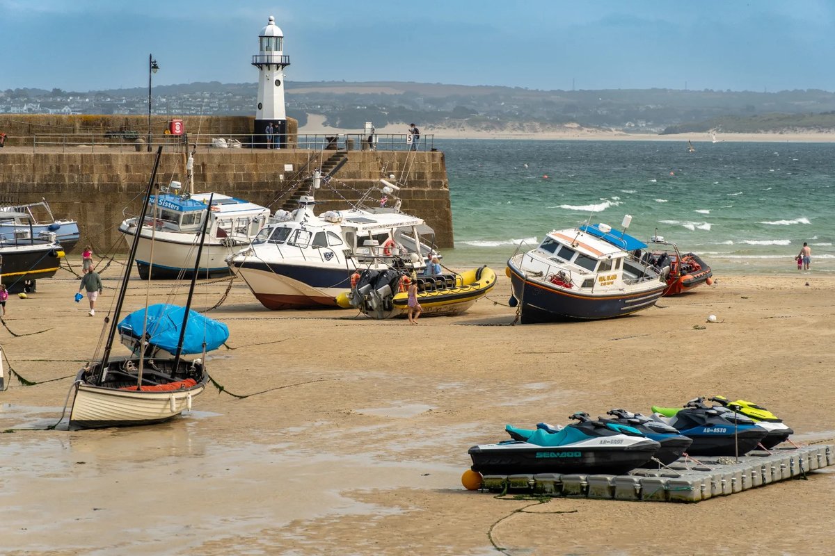 Brisa_Janine's tweet photo. Harbour life in St Ives, from the tide rolling out to boats resting on the sand. This little Cornish town never loses its charm. https://t.co/V04dAzKKJA