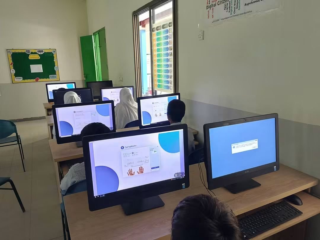 SELDGOS's tweet photo. Students at People’s School Mirpur Bathoro, District #Sujawal, are making productive use of their break time by practising typing in the computer lab alongside their regular #computerclasses.

The initiative started when students submitted written applications requesting permission for additional typing practice. Their consistent efforts are helping them enhance digital literacy, improve typing skills, and strengthen formal writing and communication abilities.

#SELD #SindhSchools #GovernmentOfSindh #SindhEducation #DigitalLearning #ComputerEducation #DigitalSkills  #SindhSchoolsReimagined
@sardarshah1 @BBhuttoZardari @MuradAliShahPPP @MinisterEduGos