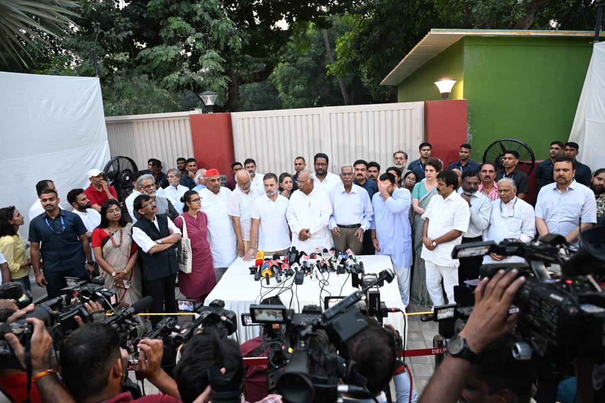 LokPoll's tweet photo. Congress president Mallikarjun Kharge, #RahulGandhi (@RahulGandhi) and other INDIA bloc leaders address the media after a meeting at Rahul Gandhi’s residence in New Delhi on Tuesday, October 13, 2026. https://t.co/pqDR2O7YDX